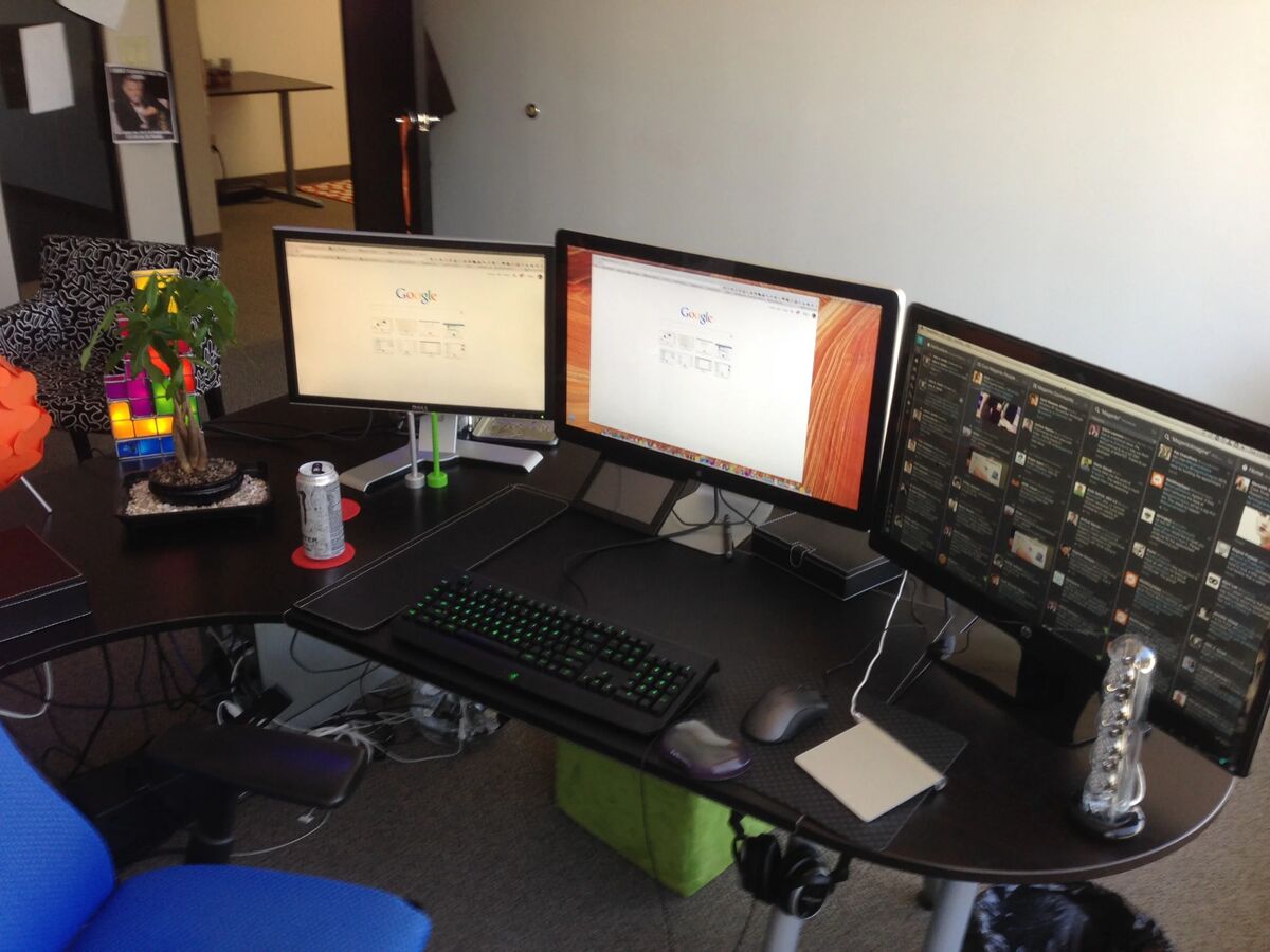 Desk setup before rearrangement - monitors